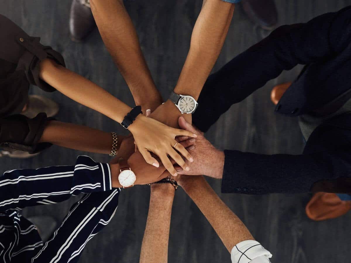 Office employees preparing to work together